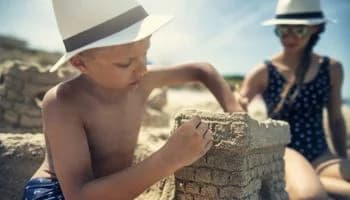 Children building sandcastles